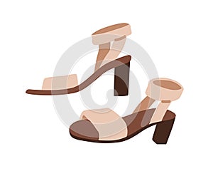 Summer open-toe sandals with ankle strap. Stylish elegant female footwear pair, block heeled shoes in fashion modern photo