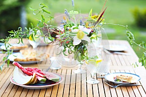 Summer outdoor party with watermellon and lemonade photo