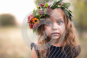 Summer outdoor portrait of beautiful happy child