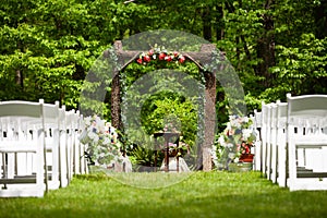 Summer Outdoor Wedding Ceremony Path with  Wooden Arch