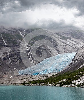 Summer overcast view to Nigardsbreen Glacier, Jostedal, Norway photo