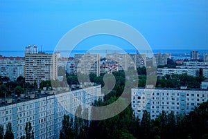 Summer panorama of residential areas of the city in the early morning from a height of the 16th floor.