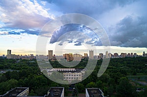 Summer panoramic view. Dramatic stormy sky over the environmentally friendly comfortable residential district in Moscow.