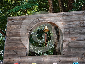 Summer park playground with swings, slides and climbing equipment. photo