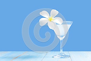 Summer in the party in holiday.  Tasty cocktail blue background.