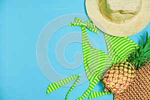 Summer Party. Time To Relax go to beach and Travel with Bikini, Hat and Pineapple Fruit on Pastel Background. Vintage Design Style