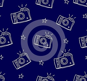 Summer pattern with camera and stars. Ornament for textile and wrapping. Vector background