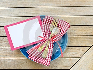 Summer Picnic Outdoor Table Placesetting with Red White and Blue Colors with fork and spoon with a Blank Card for your words, text