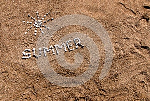 Summer picture from pebble and sand on a beach