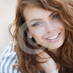 Summer portrait of a beautiful girl