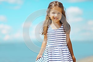 Summer portrait little girl in dress