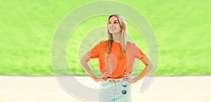 Summer portrait of stylish blonde young woman wearing sunglasses in the city