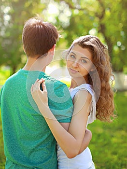 Summer portrait young charming girl and boyfriend