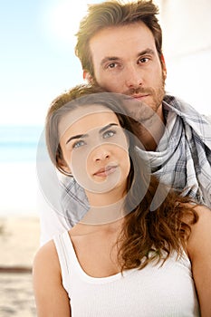 Summer portrait of young couple on beach