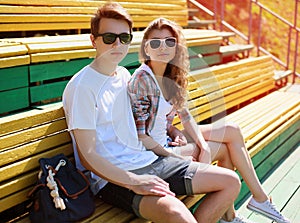 Summer portrait young modern stylish couple in sunglasses rest