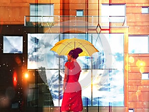 summer rain city woman with umbrella walk on street big building windows vitrines blurred light ,urban lifestyle