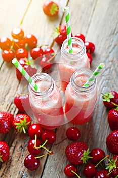 Summer red smoothies made with red berries