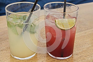 Summer refreshment with cold cocktail on the beach