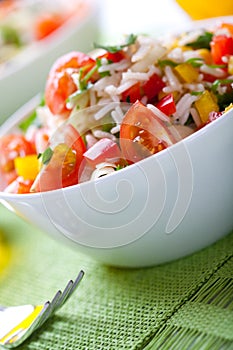 Summer rice salad with vegetables