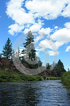 Summer river bathing in Oregon state in a lonely nature setting.