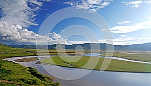 Summer river under blue sky