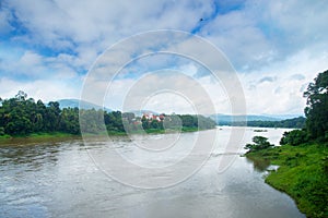 Summer riverscape with blue sky photo