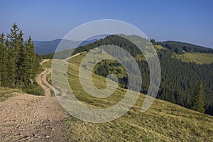 The road on the mountain ridge on a sunny day