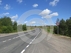 Summer road in northern latitudes