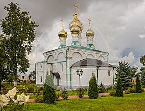 Summer rural landscape with a church. Ryazan.