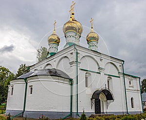 Summer rural landscape with a church. Ryazan.