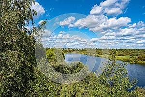 Summer rural landscape with the Lukh River in the village of Myt, Russia