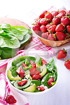 Summer salad with strawberry, avocado and spinach