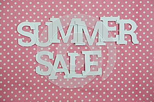 Summer Sale alphabet letters with space copy on Pink polka dot background