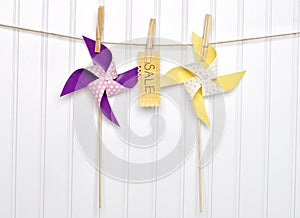 Summer Sale Concept Pinwheels with Sale Sign