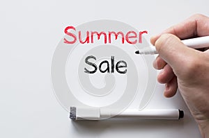 Summer sale written on whiteboard