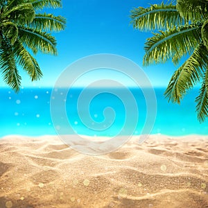 Summer sandy beach with blured tropical sea view with empty space for product display advertistment