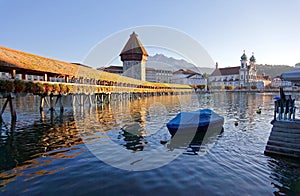 Summer scenery of Chapel Bridge Kapellbrucke over Reuss River in Lucerne Old Town