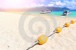 Summer Sea beach with yellow buoys, Safety Swimming zone separator,