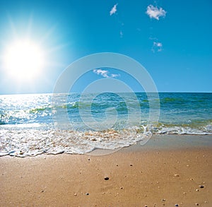 Summer sea landscape with the solar sky