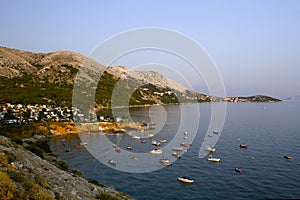 Summer sea seascape . Coastline of Stara Baska on Krk island . Ð¡ampers and caravans at the campsite.