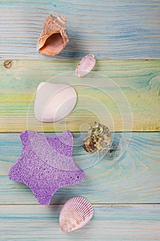 Summer sea vacation mockup background. Notebook blank page with Travel items on blue green wooden table. Sea shells