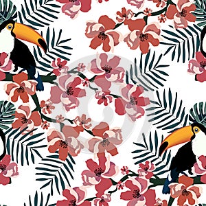 Colorful tropical seamless pattern with funny toucans,flowers and leafs.Summer vector background.Graphic textile texture photo