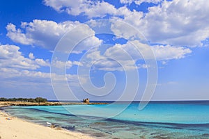 Summer seascape,Apulia coast: Marina di Lizzano beach Taranto, Torretta bay. In the background the Torretta watchtower. photo