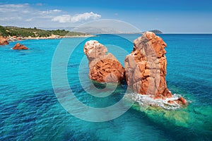 Summer seascape Turquoise sea water with beautiful rocks closeup. Island of sardinia in Italy