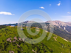 Summer Sheregesh Kemerovo region, Russia, panorama of Mount Zelenaya and Mustag. Aerial top view