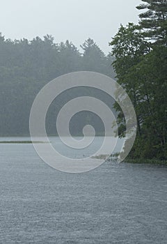 Summer shower over Beaver Pond in Allenstown, New Hampshire