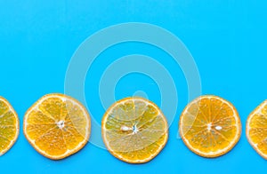 Summer of slice orange fruit on blue background