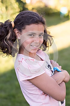 Summer.smiling girl in shorts is in the garden