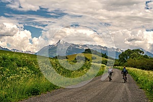 Summer sport activities. Cyclist riding in the high Tatras, with peak Krivan at background in Slovakia.