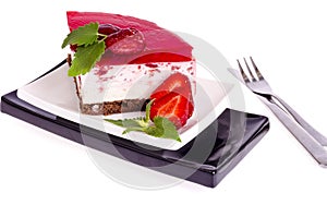 Summer strawberry mousse cake with fresh berries on white background.